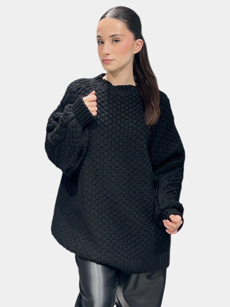 Pull en maille torsadée